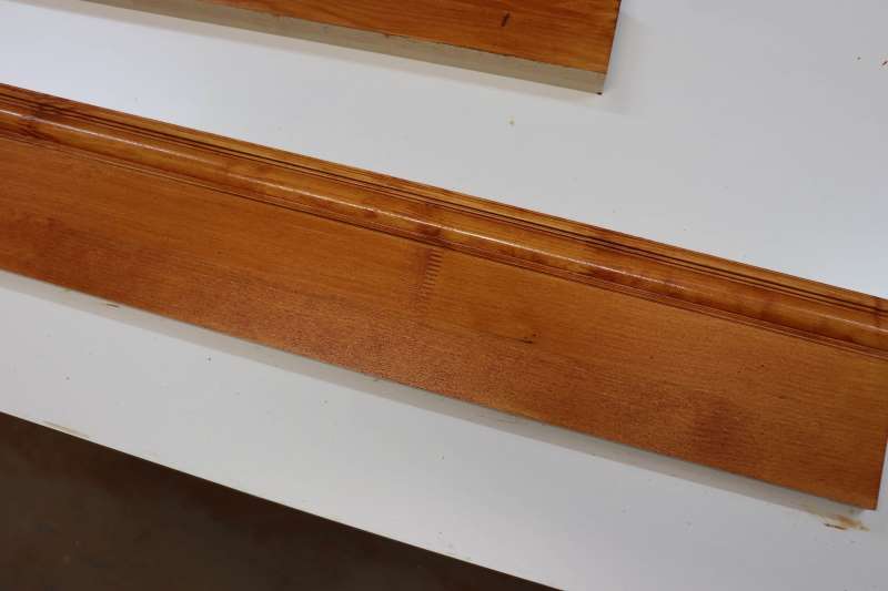 close up of stained finger joint pine skirting